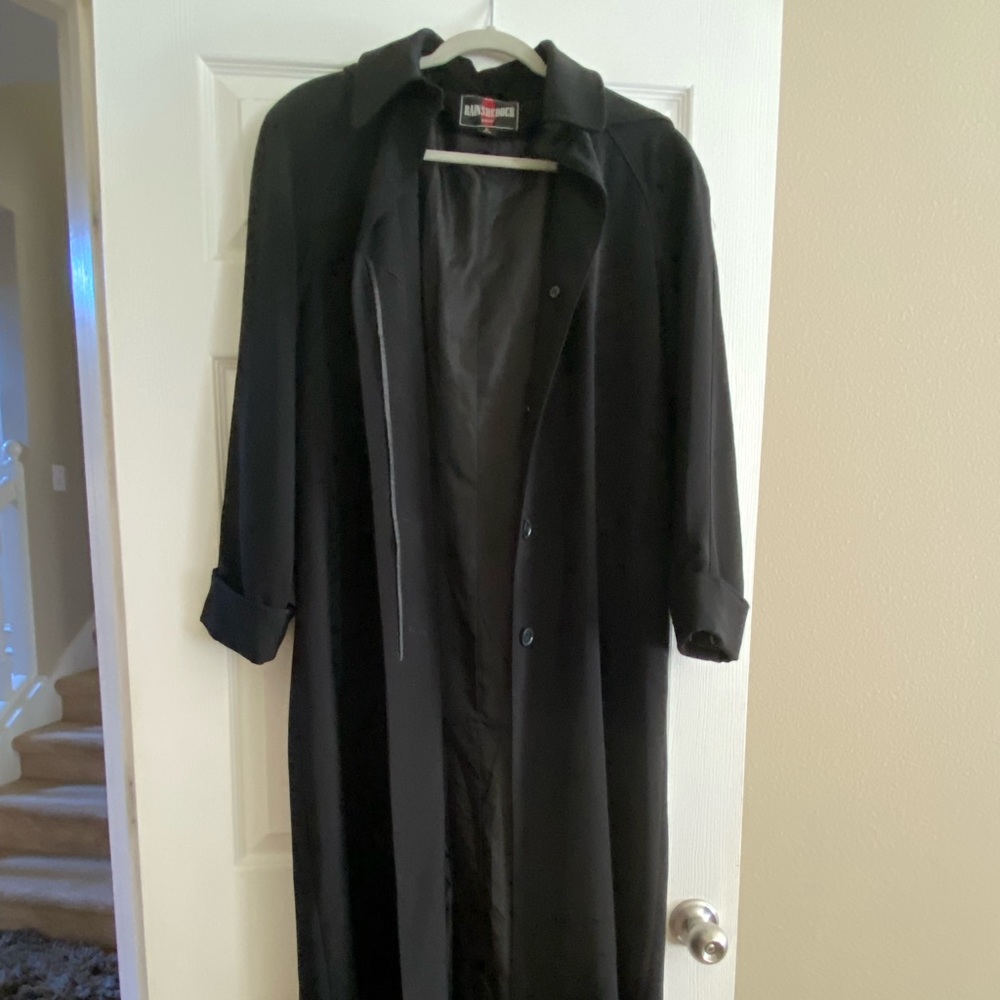 Black hooded rain coat trench
